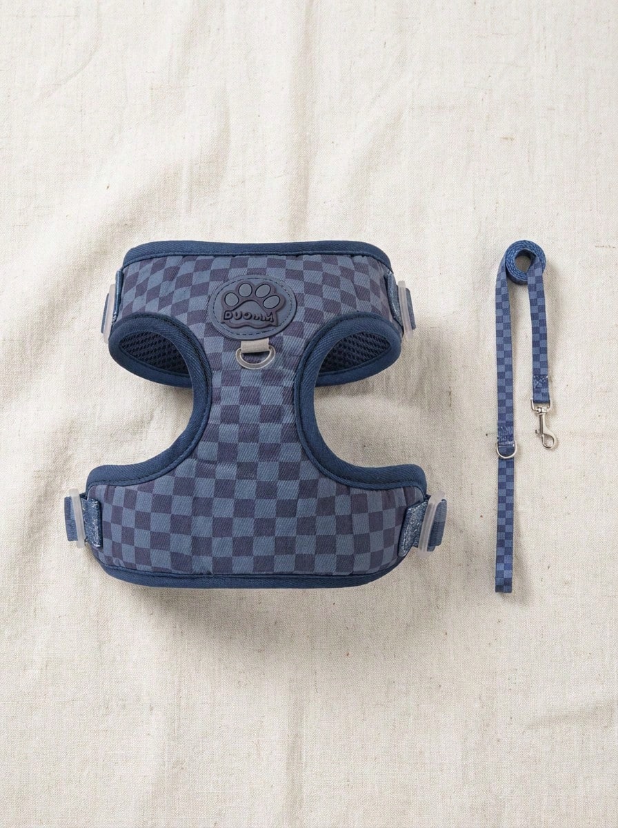 Navy blue checkered dog harness and leash set made from polyester with breathable mesh, adjustable fit, back circular ring, and matching leash for cats or small dogs.