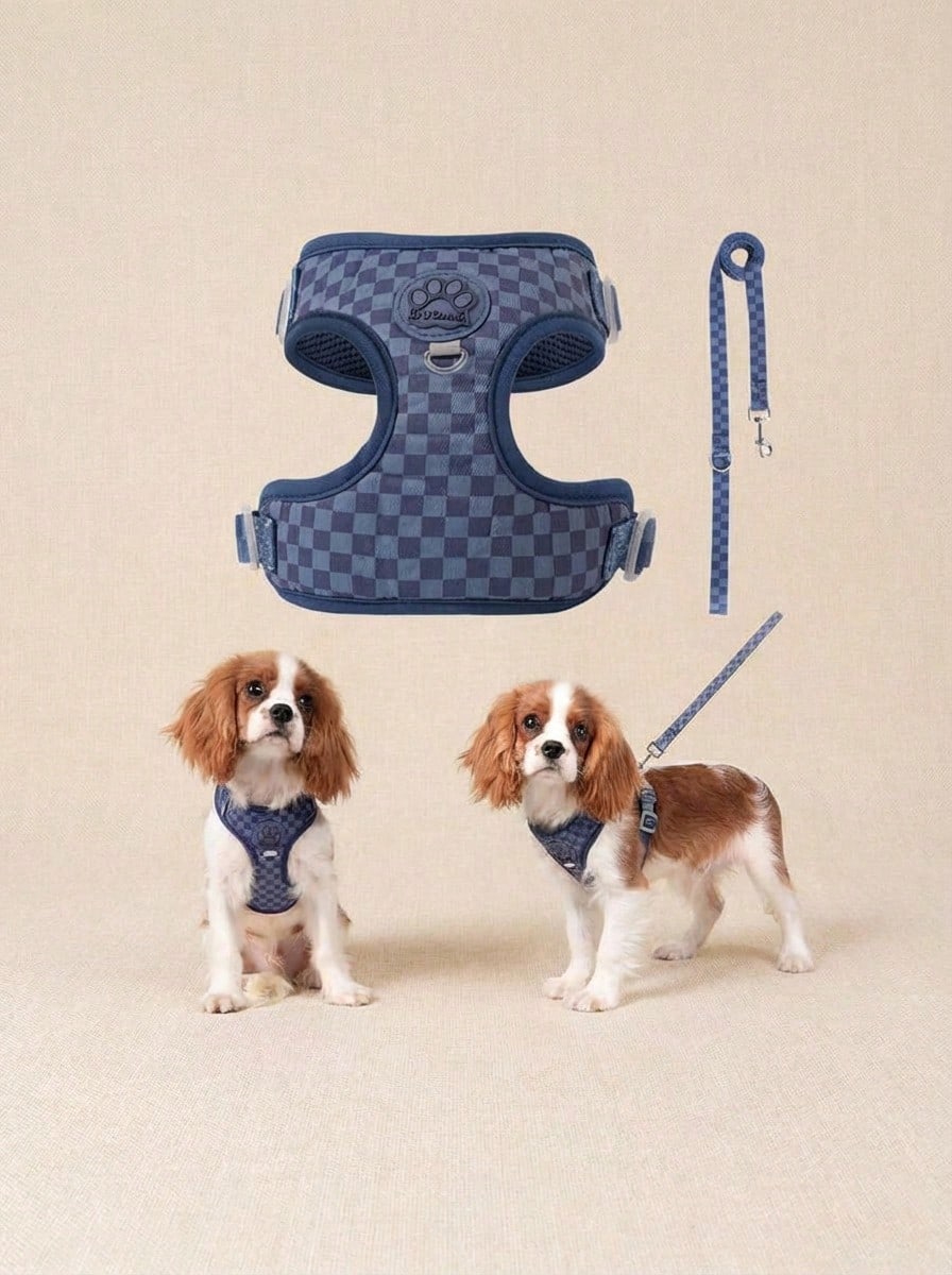 Navy blue checkered dog harness and leash set made from polyester with breathable mesh, adjustable fit, back circular ring, and matching leash for cats or small dogs.