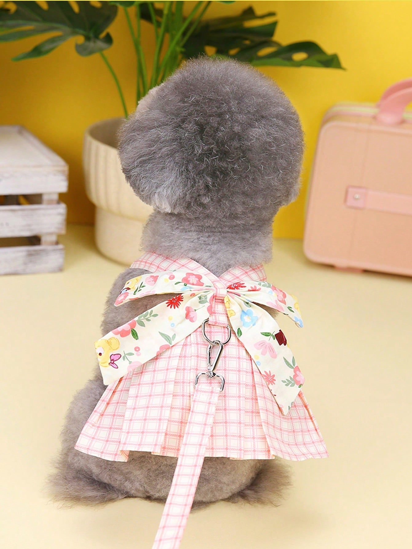 Pet harness skirt set with leash for cats and dogs, featuring a chest and back strap design with sweet princess skirt styling for walking.