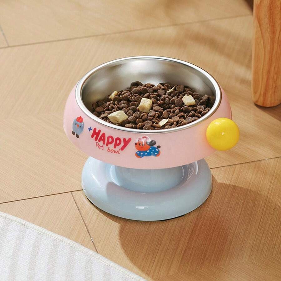 Elevated pet food bowl with cute cartoon style design, stainless steel lining, PP stand, and anti-slip base for cats and dogs.