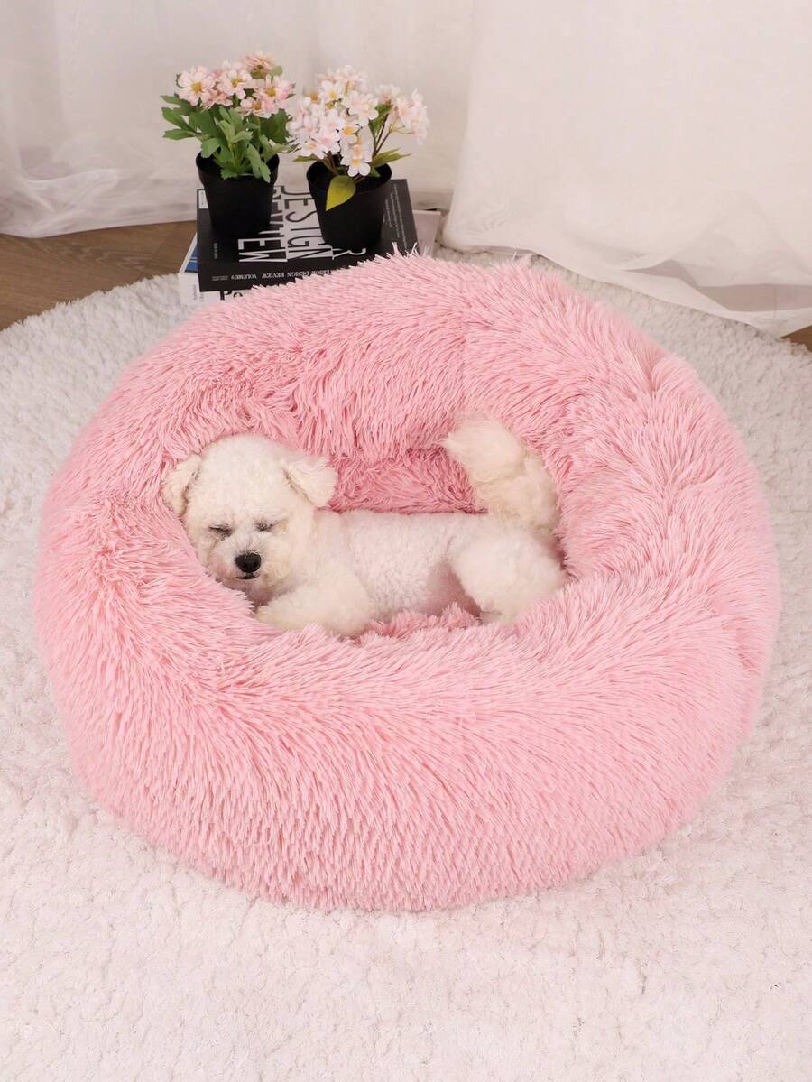Pink plush round pet bed soft sleep cushion for cats and dogs filled with polypropylene fibers