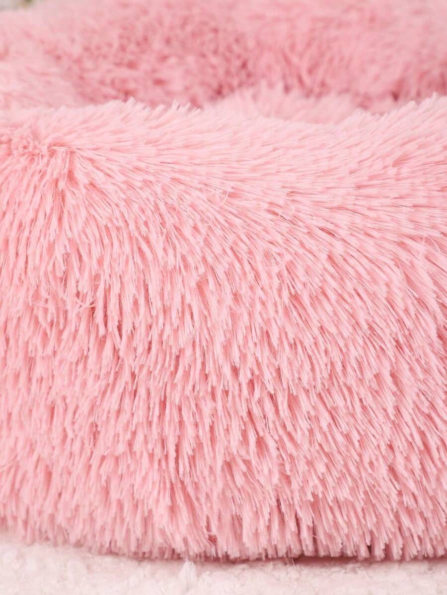Pink plush round pet bed soft sleep cushion for cats and dogs filled with polypropylene fibers