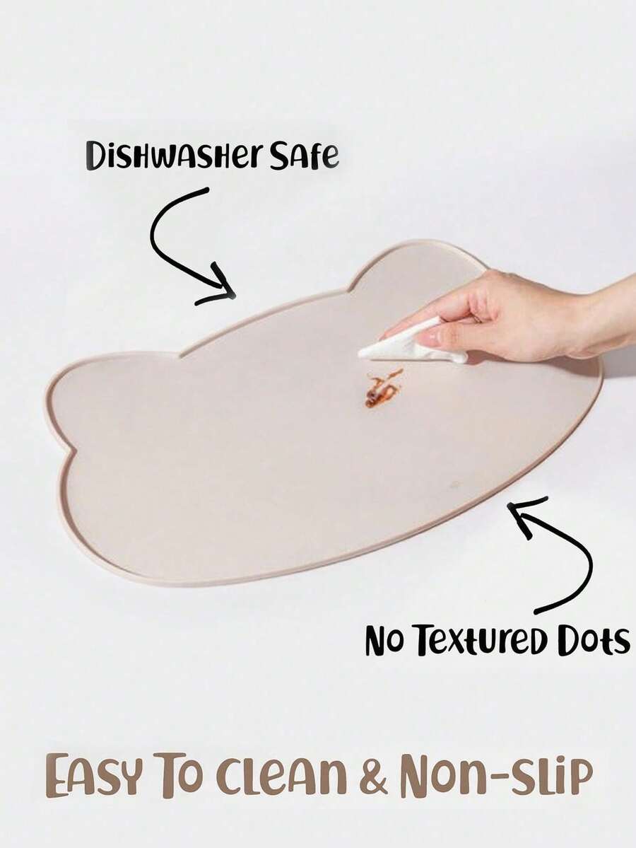 Multicolor silicone pet food mat with cartoon pattern, waterproof non-slip surface, and raised edges for dog and cat bowls.