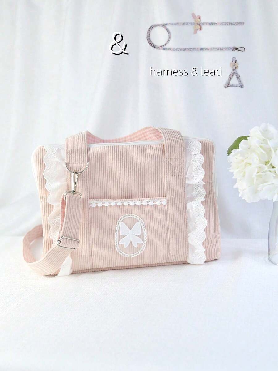 Pink polyester pet carrier bag with shoulder strap for small dogs and cats