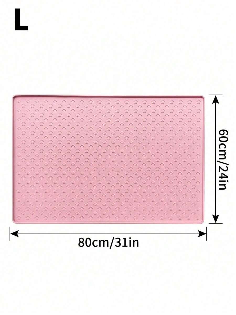 Pink silicone pet placemat featuring a colorblock pattern and paw prints for cats and dogs