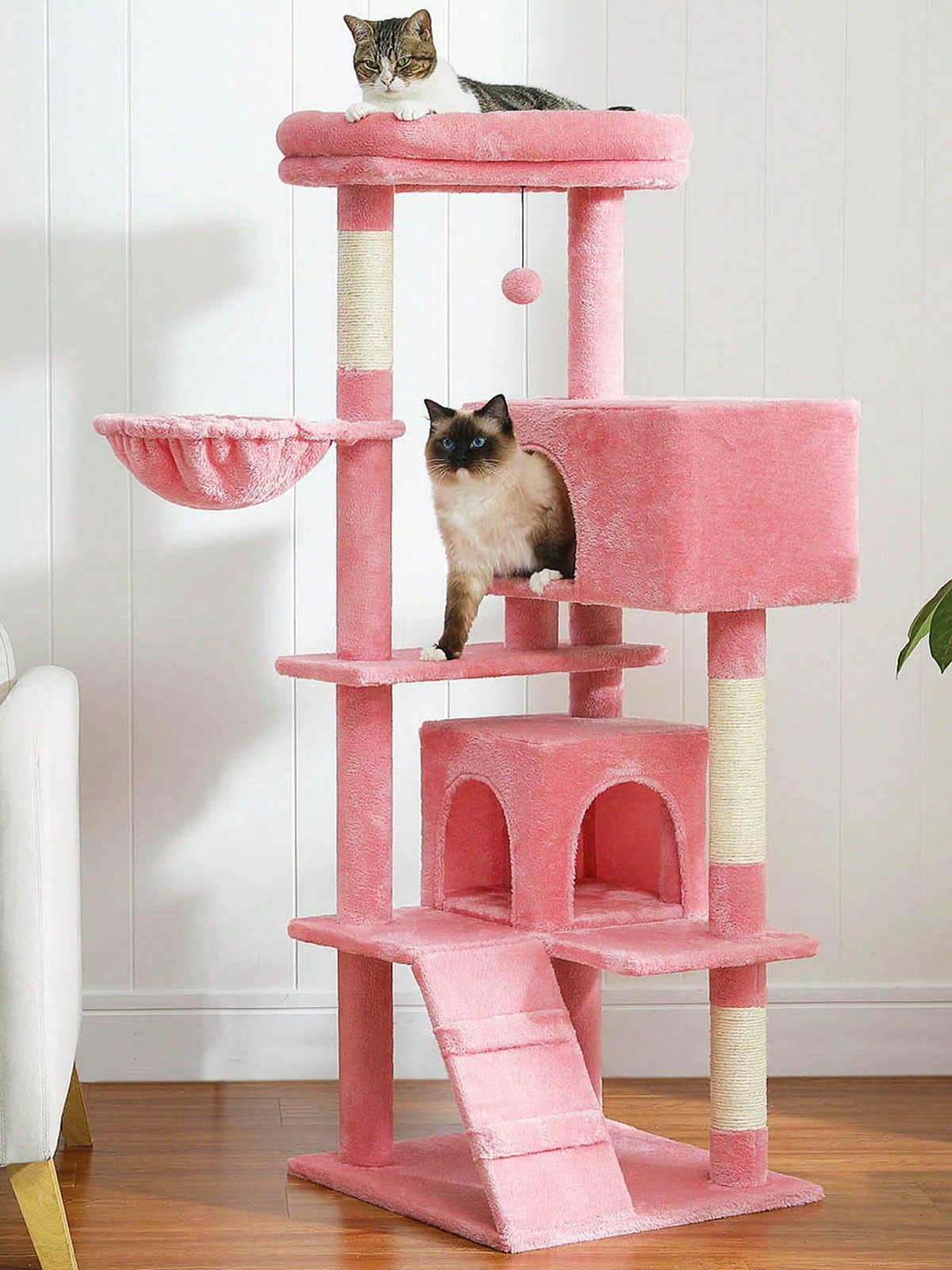 56.3 inch grey multi-level cat tree with large top perch, two condos, plush hammock, and sisal scratching posts.