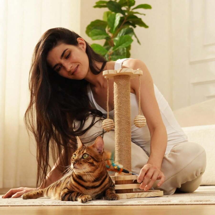 Multicolor 4-in-1 wooden cat scratching post activity center featuring horizontal ball tracks, an interactive feather toy, and sisal suspension balls.