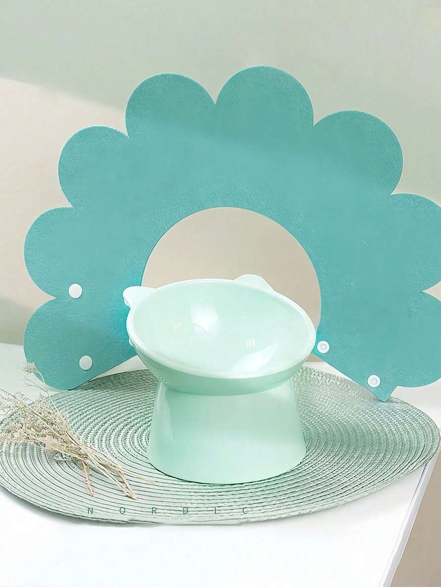 Multicolor ABS 15 degree slanted anti-vomiting pet bowl with stable base and cartoon pattern for indoor cats and dogs.