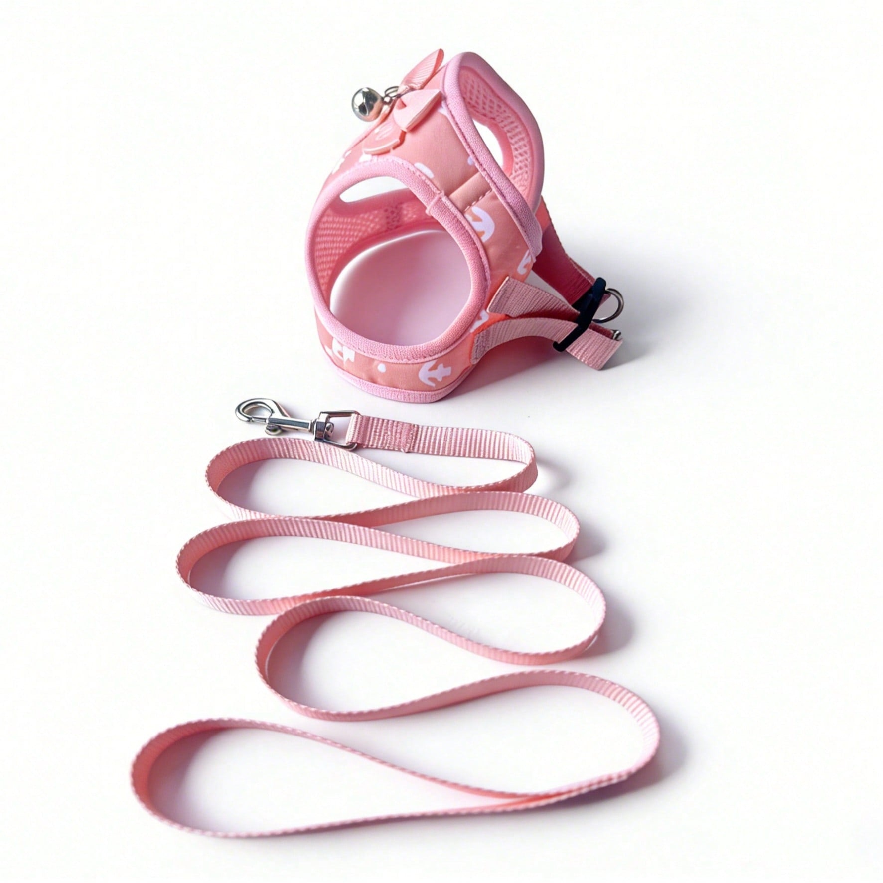 Pink polyester pet harness and leash set with bow design for cats, dogs, kittens, and puppies