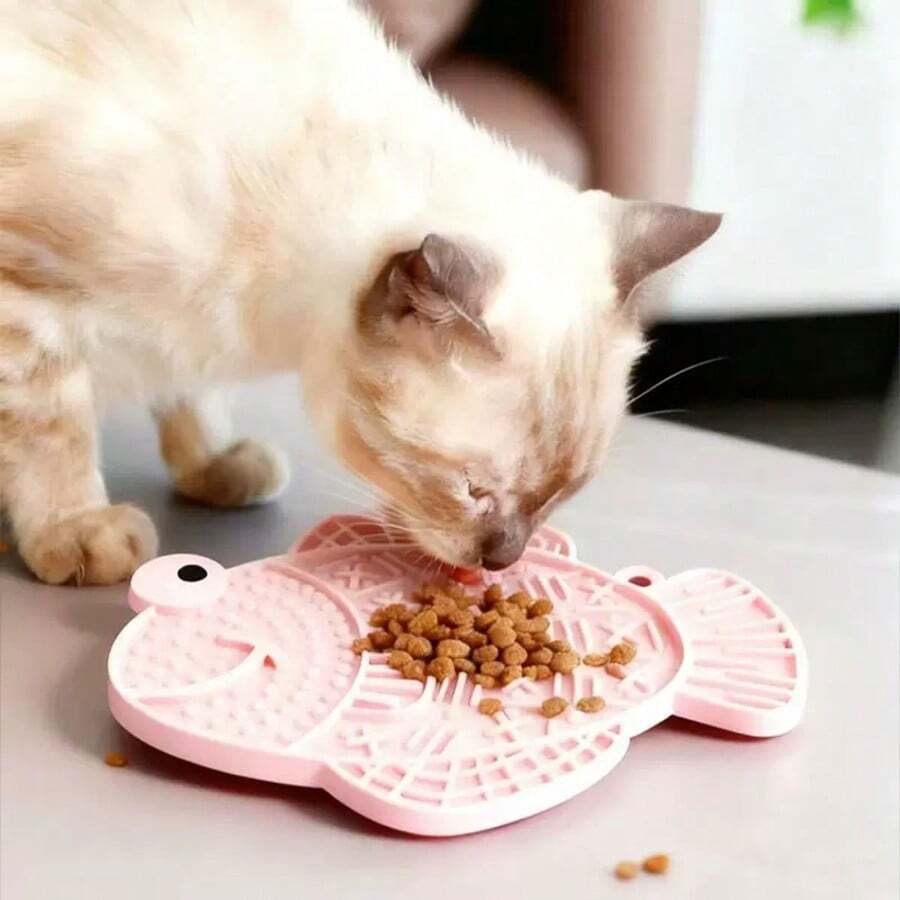 Multicolor silicone slow feeder lick mat with suction cups for dogs and cats featuring fish and frog shape design.