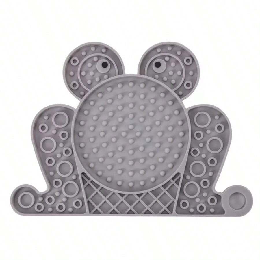Multicolor silicone slow feeder lick mat with suction cups for dogs and cats featuring fish and frog shape design.