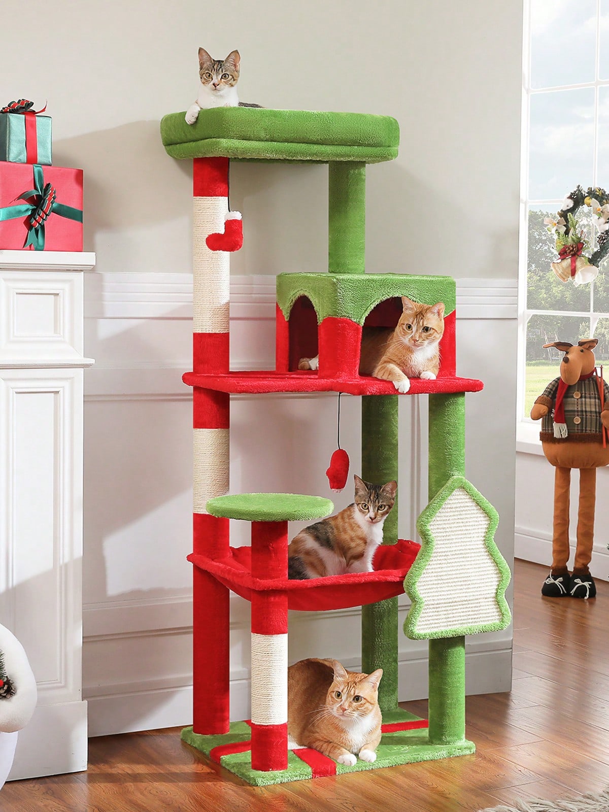 Red 56.3-inch tall multi-level cat tree tower for indoor cats featuring a cozy plush top perch, spacious cat condo, large hanging hammock, and natural sisal scratching posts.