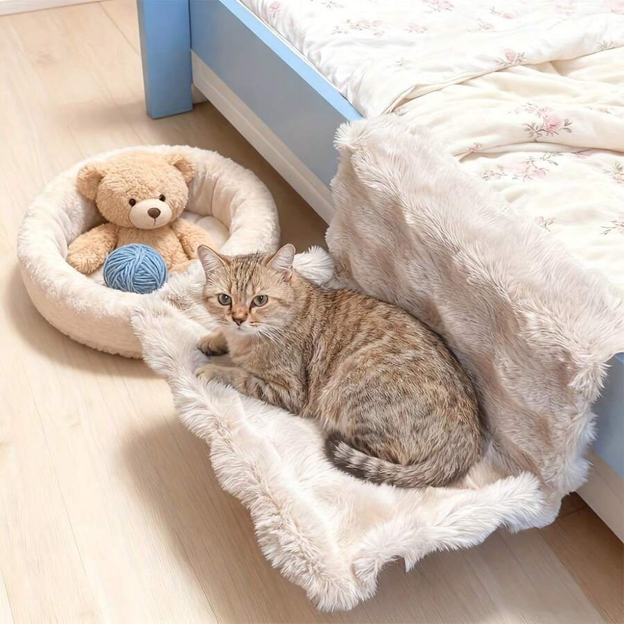 Plush cat bedside hammock bed hung on a bed edge, featuring soft warm polyester cushion for small cats and dogs.