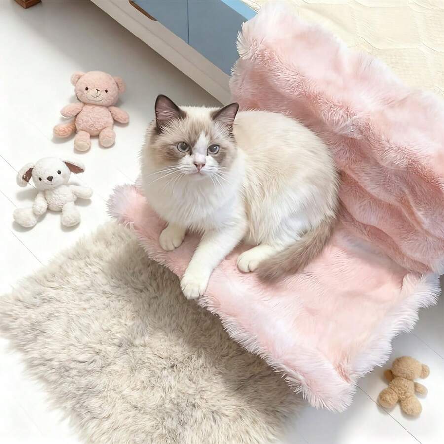 Plush cat bedside hammock bed hung on a bed edge, featuring soft warm polyester cushion for small cats and dogs.