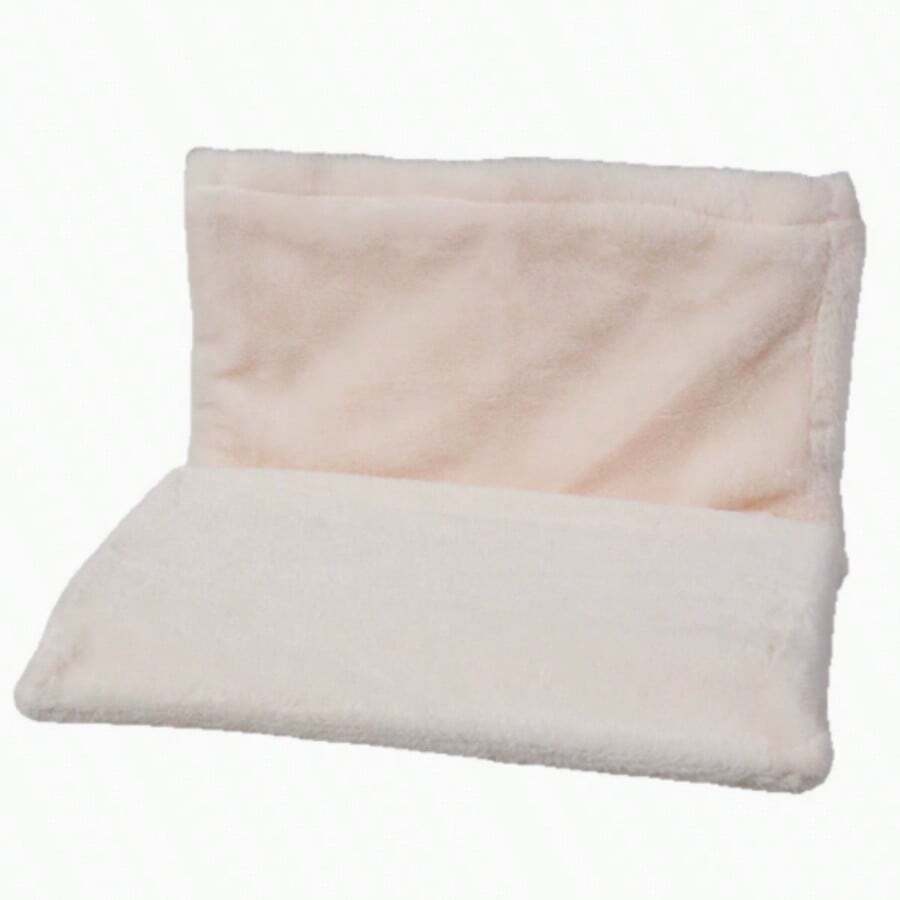 Plush cat bedside hammock bed hung on a bed edge, featuring soft warm polyester cushion for small cats and dogs.