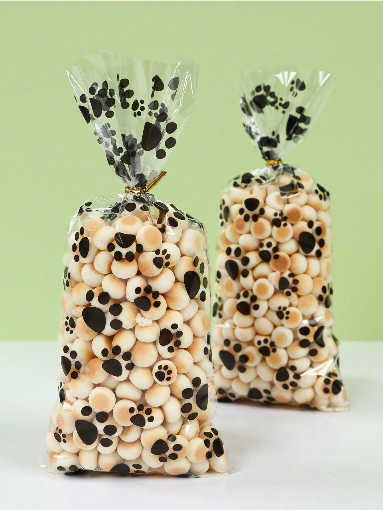 50pcs Plastic Paw Print Gift Bags With Twist Tie, Pet Treats Candy Bags, Portable Pet Bags, Puppy Paw Print Pattern Gift Packaging Bags, Pet Decoration, Baby Shower Party Decoration, Gender Reveal Party Decoration, Puppy Birthday Party Decoration, Dog Paw