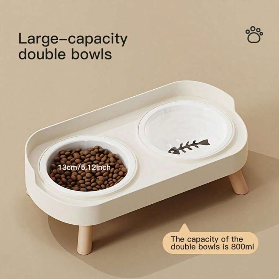 An elevated double bowl feeder for dogs made of durable ABS material in a colorblock design with an 800ml capacity for food and water.