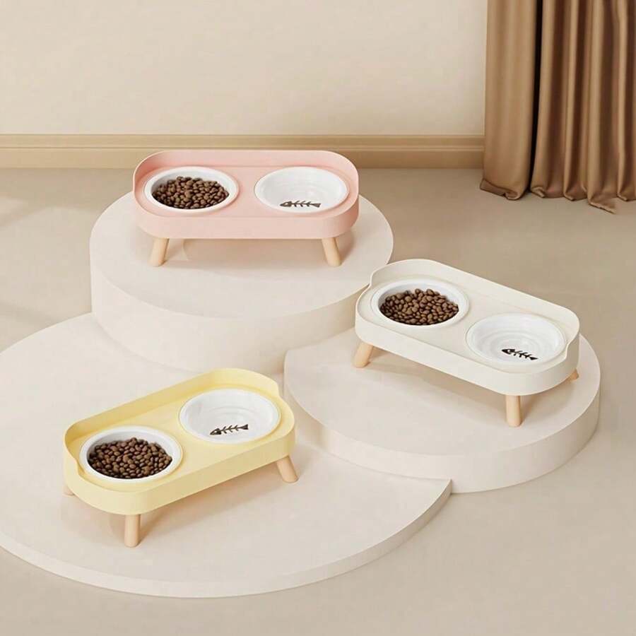 An elevated double bowl feeder for dogs made of durable ABS material in a colorblock design with an 800ml capacity for food and water.