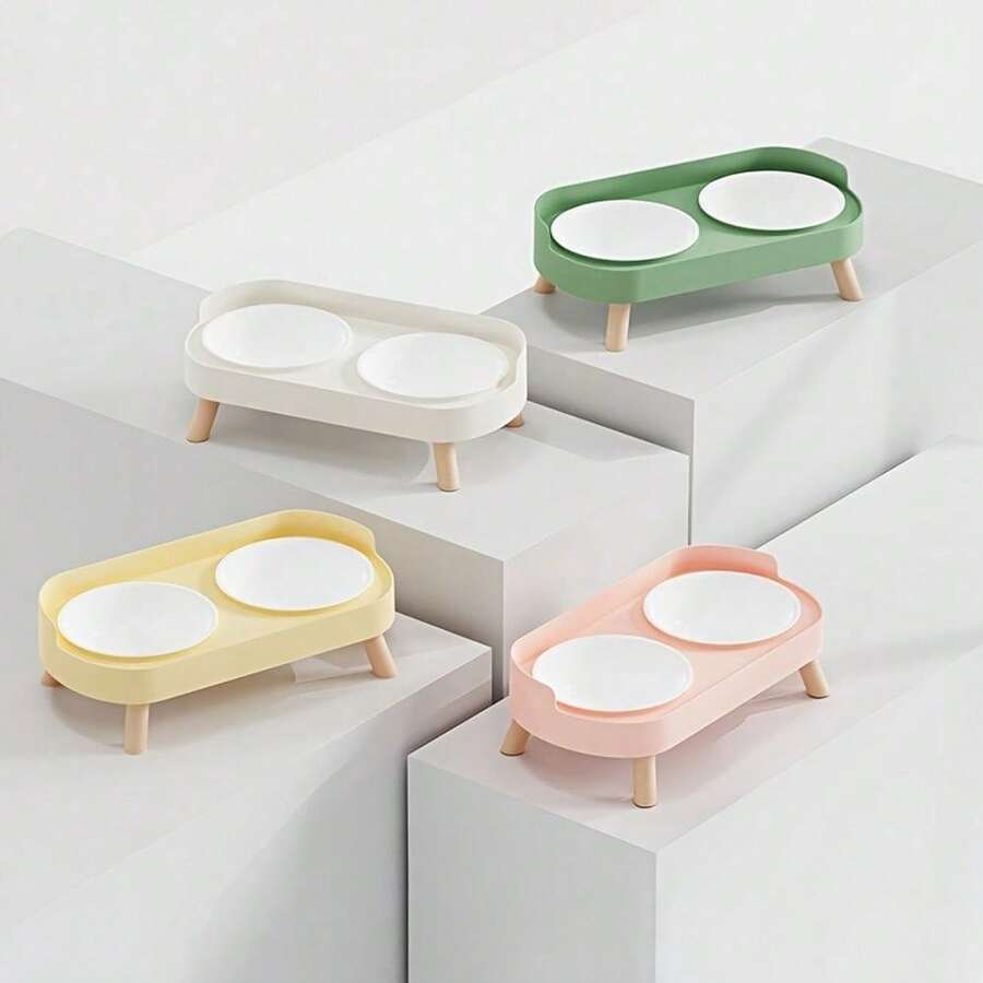 An elevated double bowl feeder for dogs made of durable ABS material in a colorblock design with an 800ml capacity for food and water.