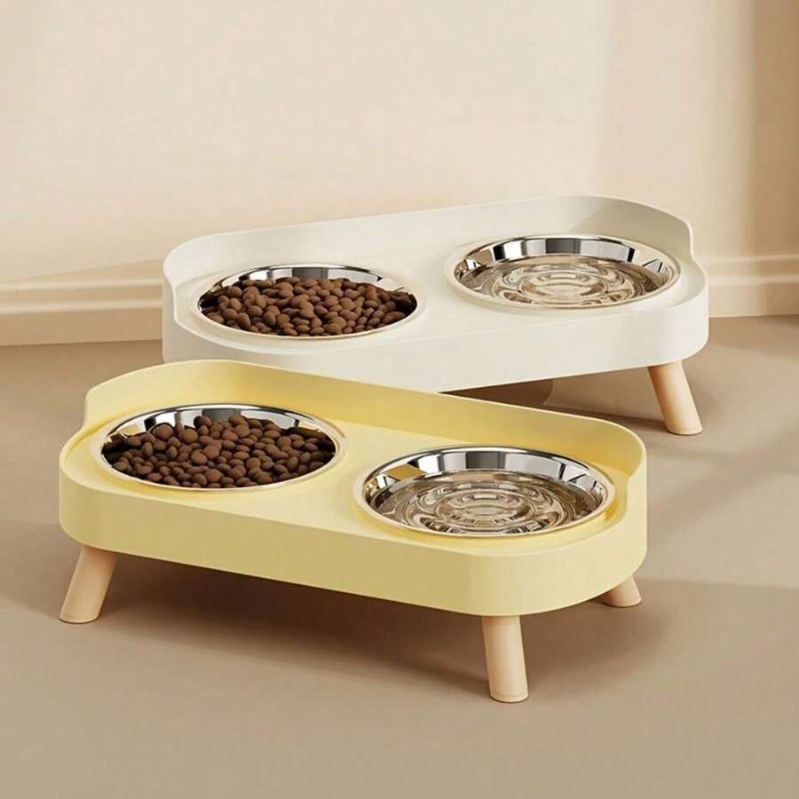 An elevated double bowl feeder for dogs made of durable ABS material in a colorblock design with an 800ml capacity for food and water.