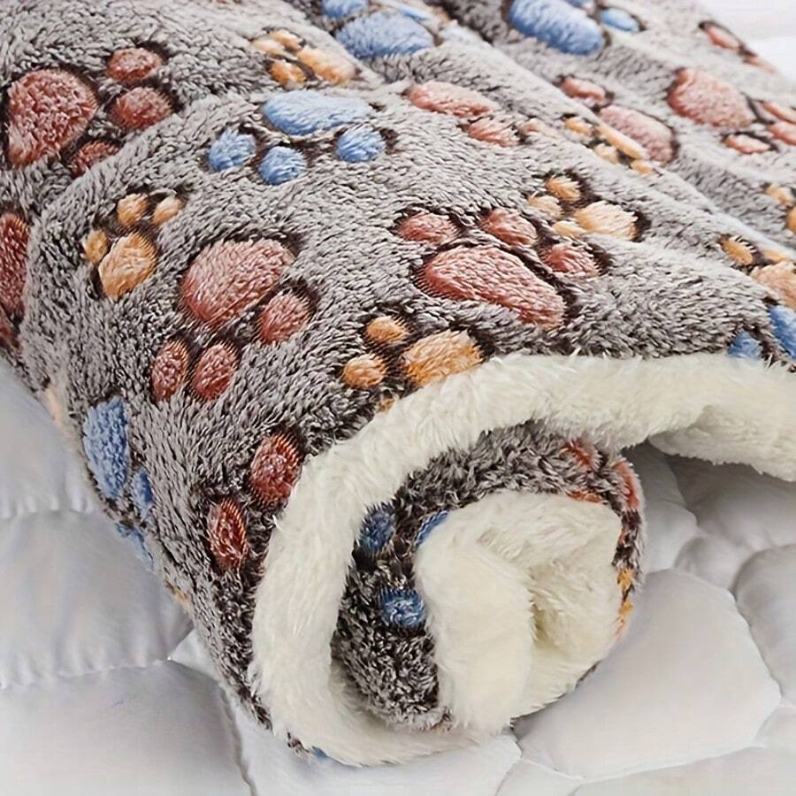 Coffee brown thick and soft pet pad featuring a graphic pattern, suitable for small dogs and cats on floors, sofas, or in crates.