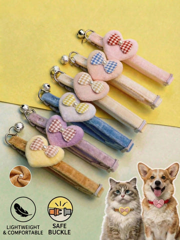 Multicolor adjustable polyester pet collar with cartoon heart-shaped bow decoration and bell pendant for small and medium cats and dogs.