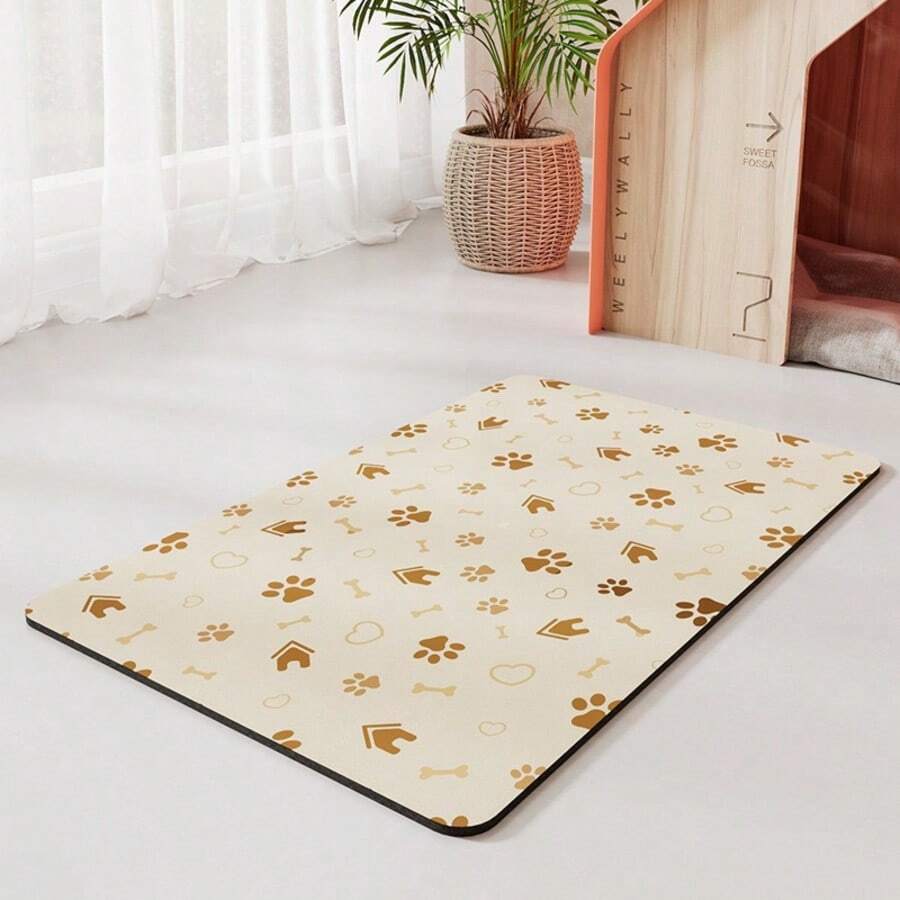 Diatomite pet feeding mat featuring a cute black paw print pattern and wood grain design under cat and dog food bowls.