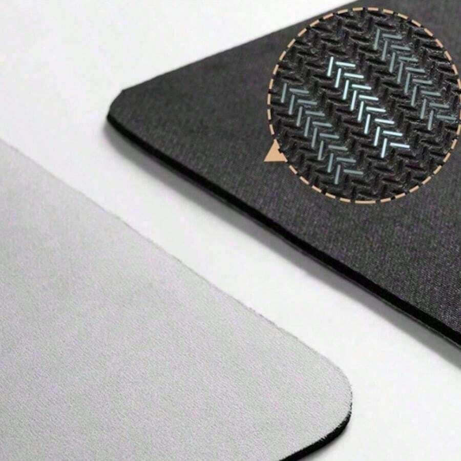 Diatomite pet feeding mat featuring a cute black paw print pattern and wood grain design under cat and dog food bowls.