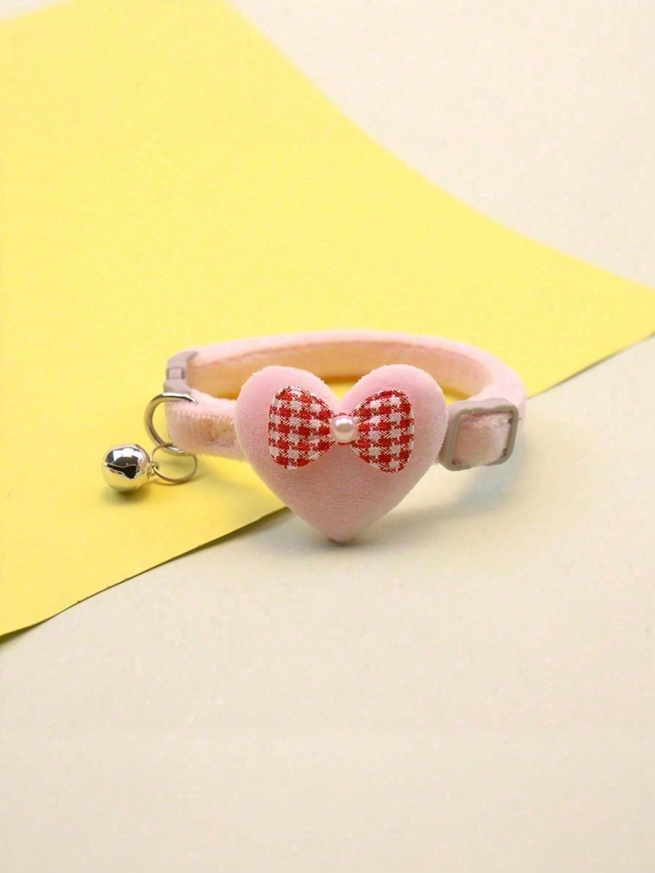 Multicolor adjustable polyester pet collar with cartoon heart-shaped bow decoration and bell pendant for small and medium cats and dogs.