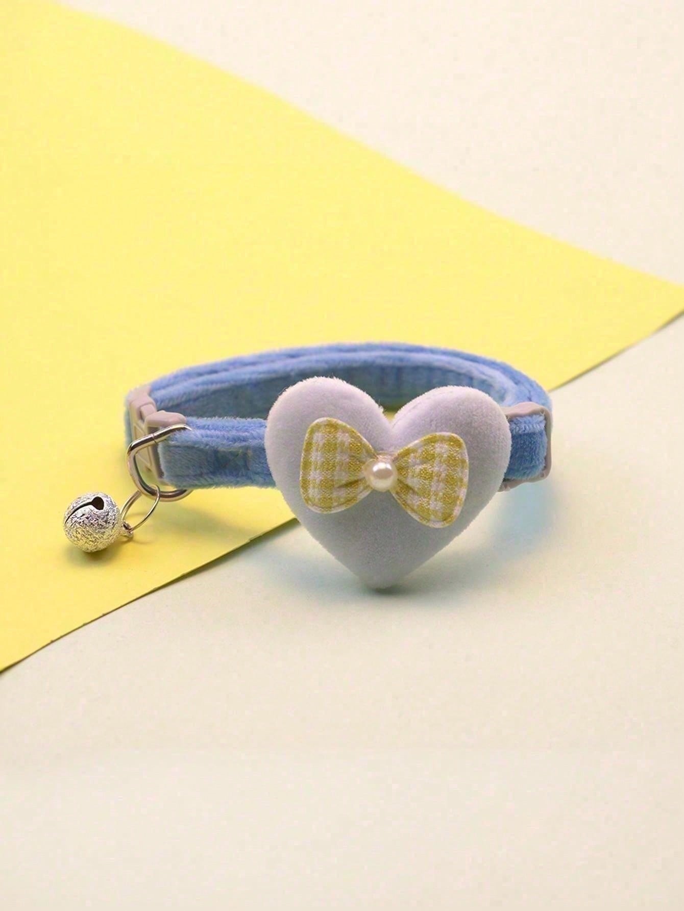 Multicolor adjustable polyester pet collar with cartoon heart-shaped bow decoration and bell pendant for small and medium cats and dogs.