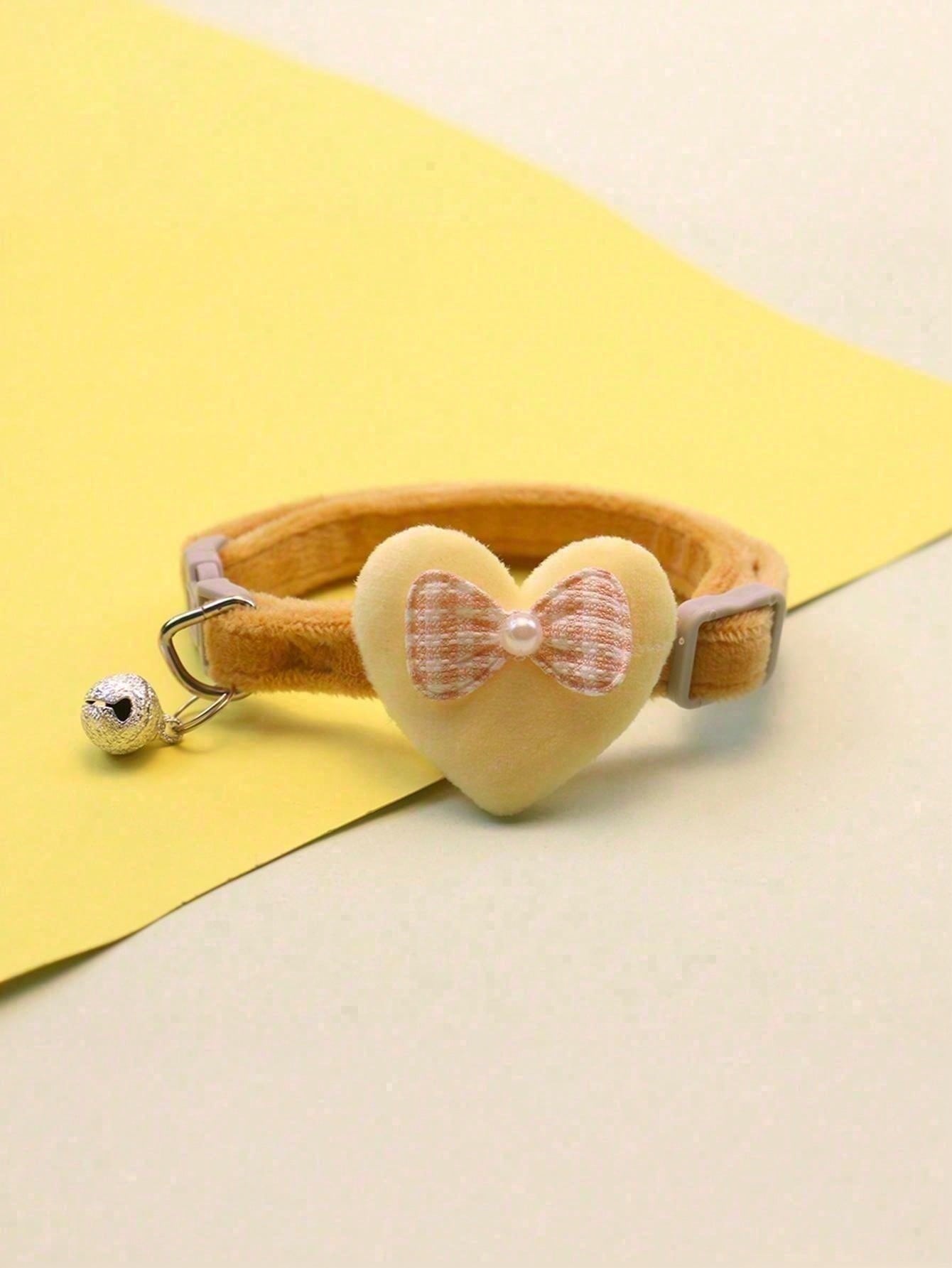 Multicolor adjustable polyester pet collar with cartoon heart-shaped bow decoration and bell pendant for small and medium cats and dogs.
