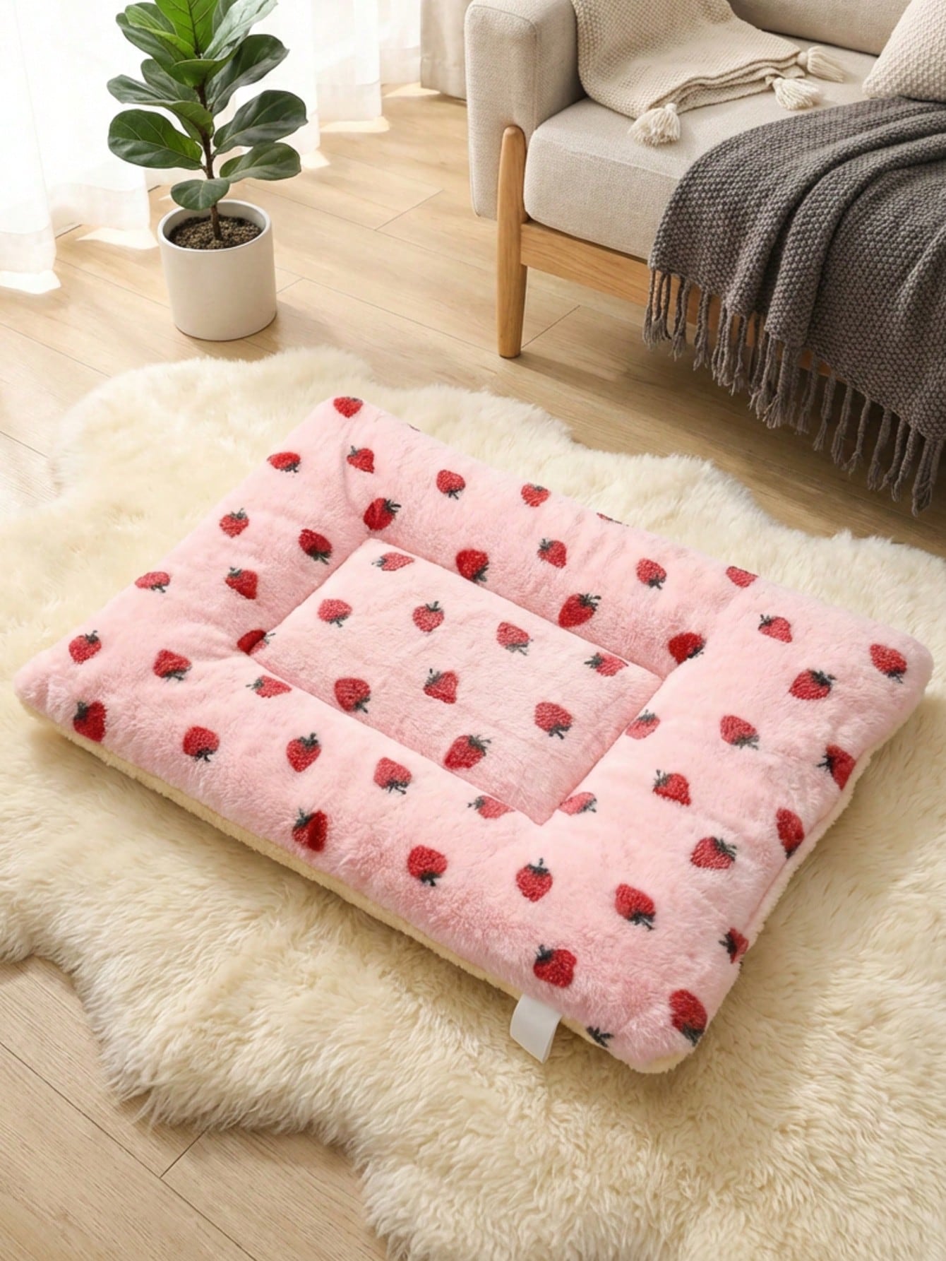 Multicolor soft strawberry print pet sleeping mat for cats and dogs made from 100% polyester with plush filling.