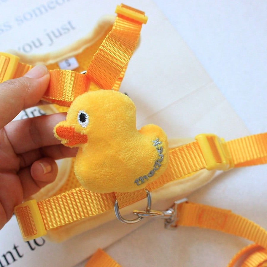 Adjustable nylon pet leash and vest-style harness set with cartoon duck design for cats and small dogs, suitable for outdoor walks or decorative use