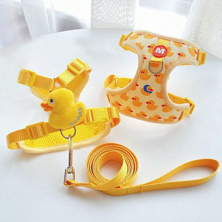 Adjustable nylon pet leash and vest-style harness set with cartoon duck design for cats and small dogs, suitable for outdoor walks or decorative use