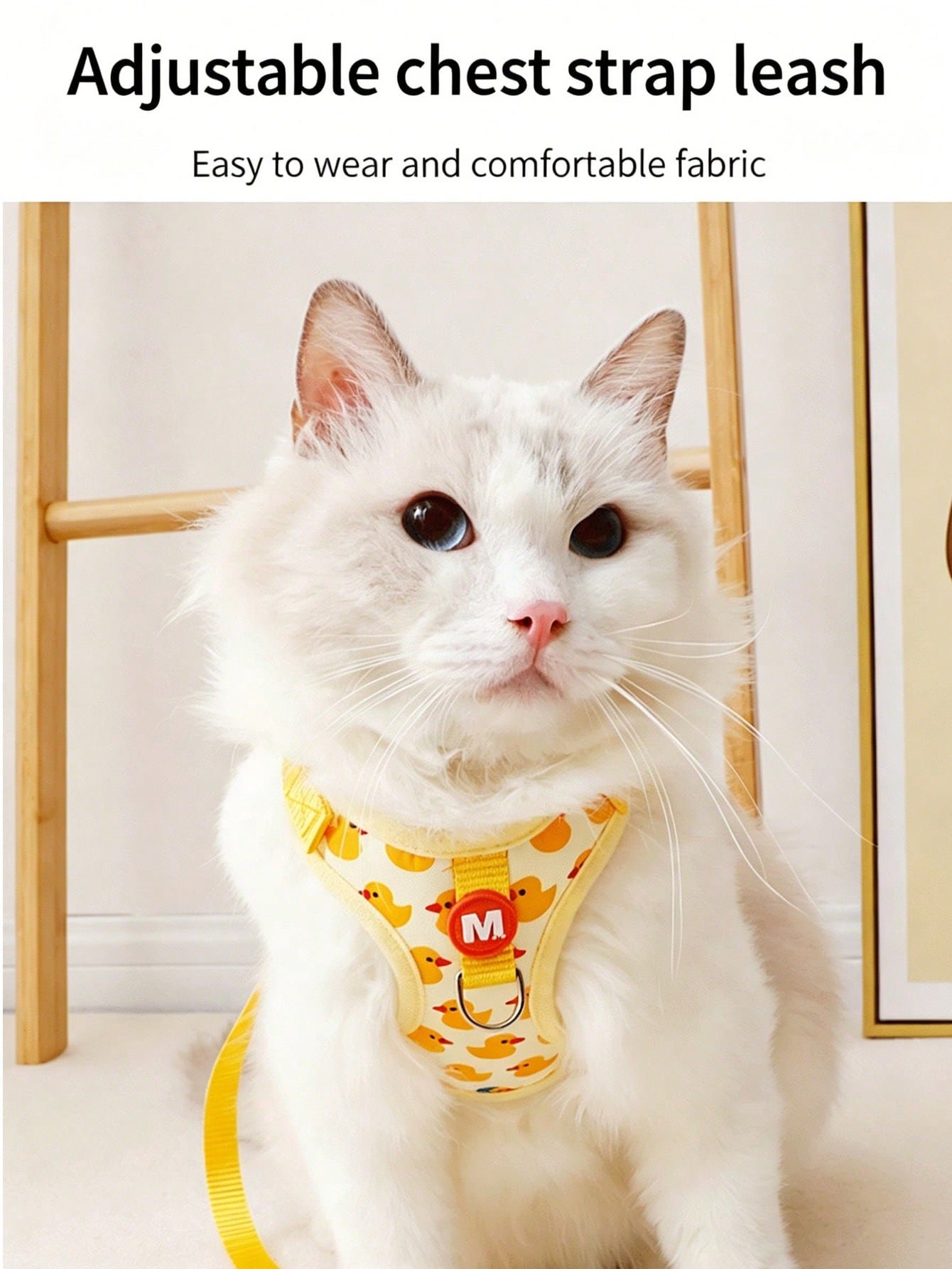 Adjustable nylon pet leash and vest-style harness set with cartoon duck design for cats and small dogs, suitable for outdoor walks or decorative use