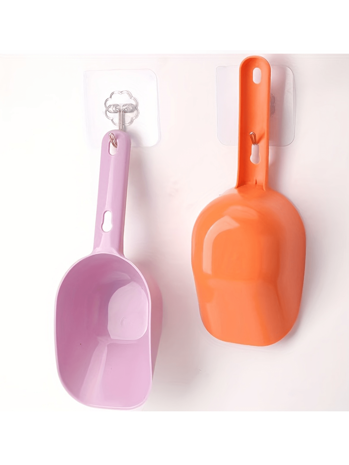 Multicolor plastic pet food scoop with an ergonomic handle for measuring dog and cat food