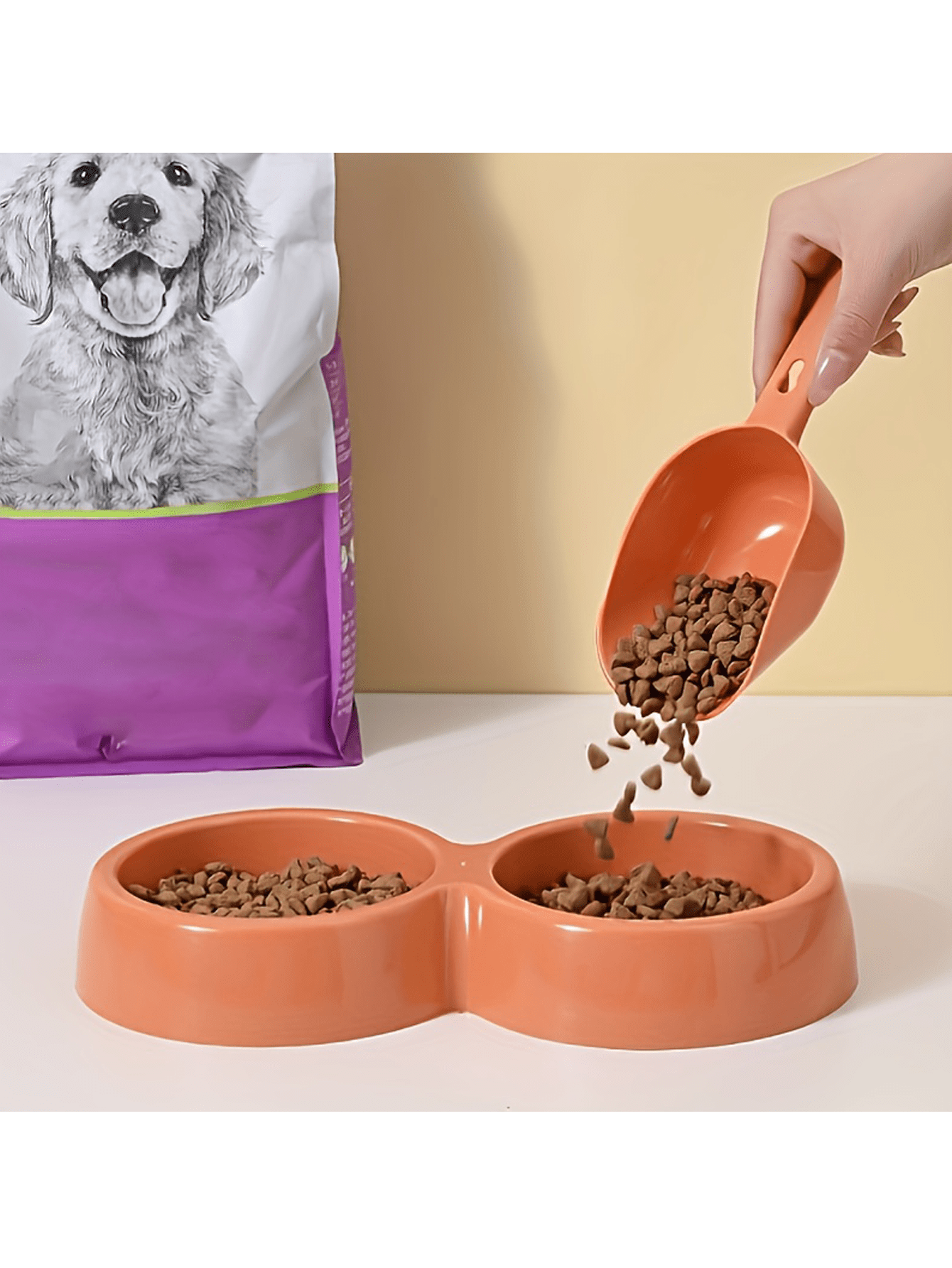 Multicolor plastic pet food scoop with an ergonomic handle for measuring dog and cat food