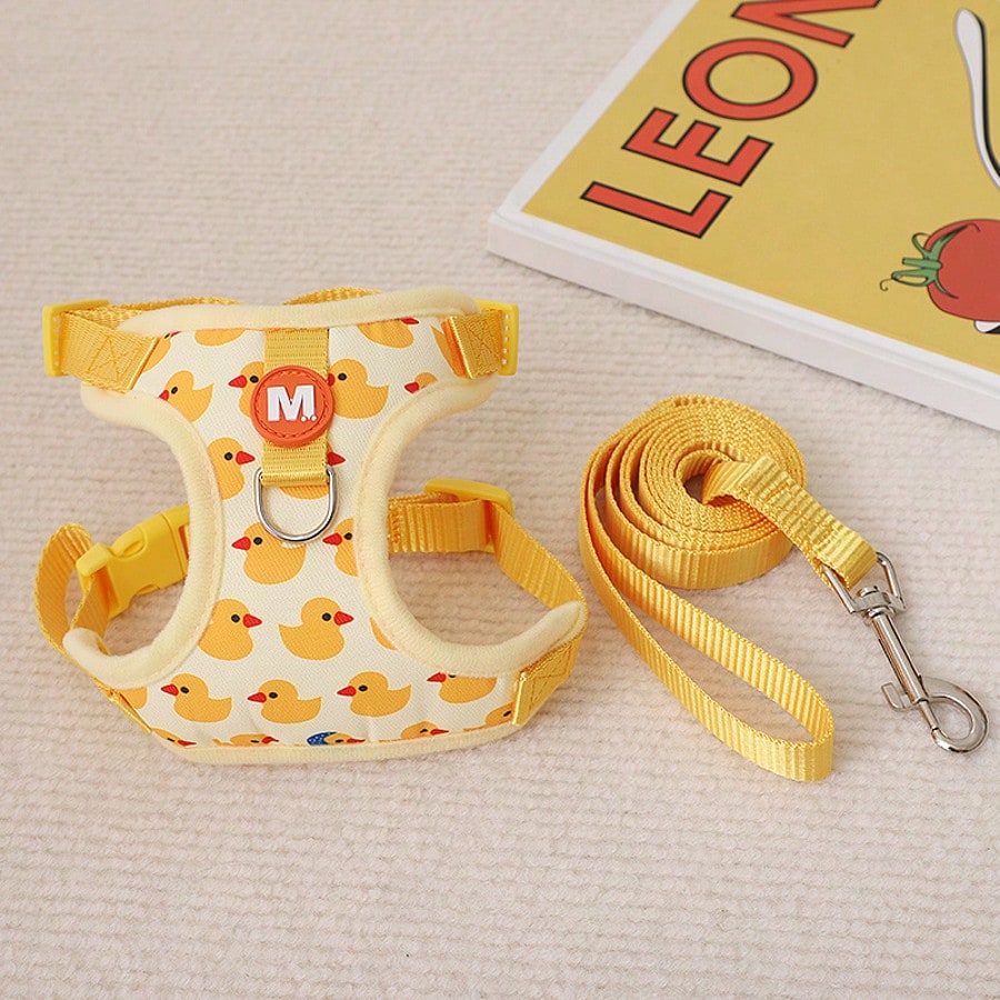 Adjustable nylon pet leash and vest-style harness set with cartoon duck design for cats and small dogs, suitable for outdoor walks or decorative use