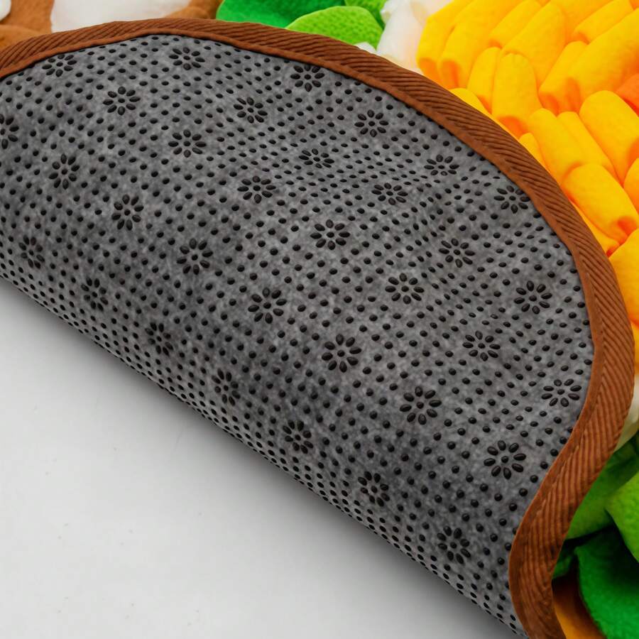 Yellow flower-shaped pet snuffle mat and slow feeder scent training pad for dogs and cats with fruit and vegetable print.