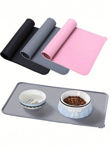 Rectangular solid color silicone pet food bowl mat with non-slip and waterproof surface for dog and cat feeding.