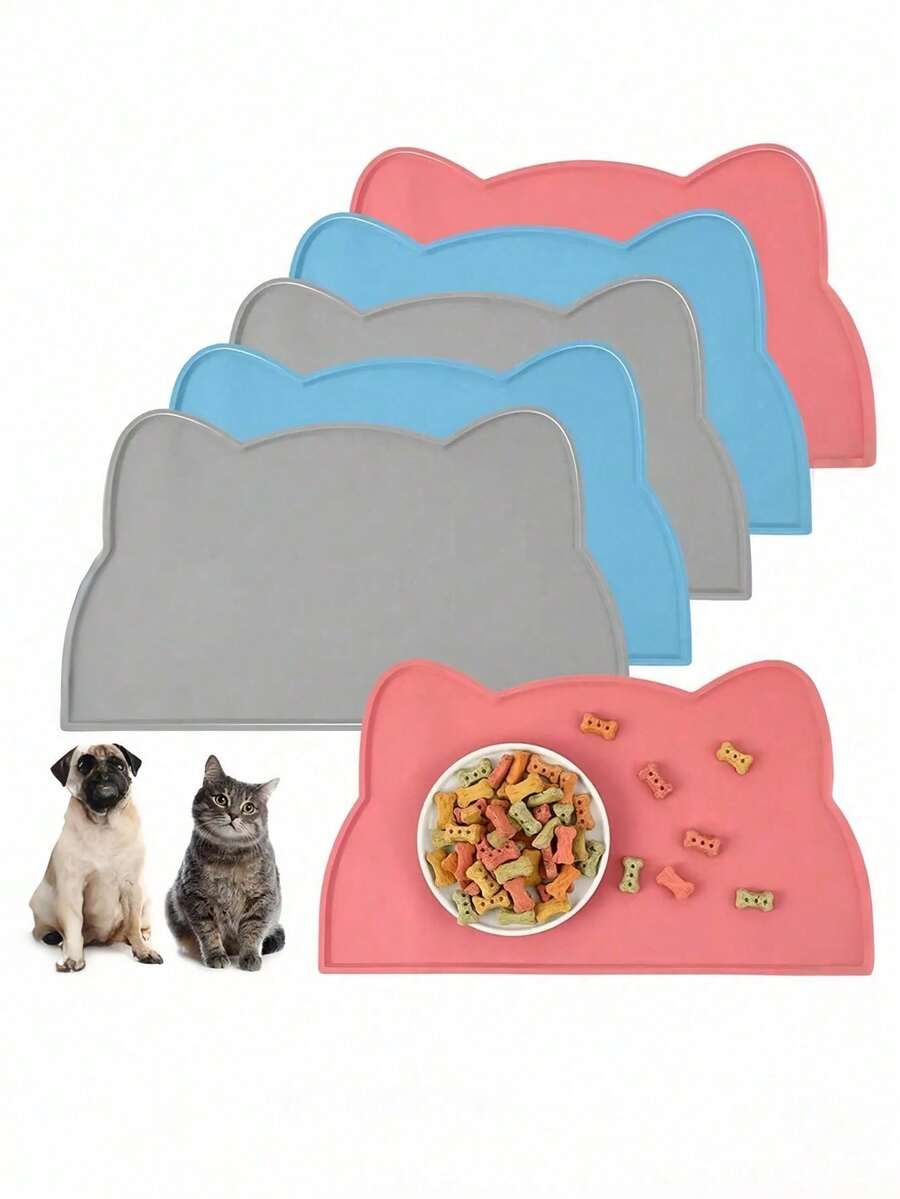 Rectangular solid color silicone pet food bowl mat with non-slip and waterproof surface for dog and cat feeding.