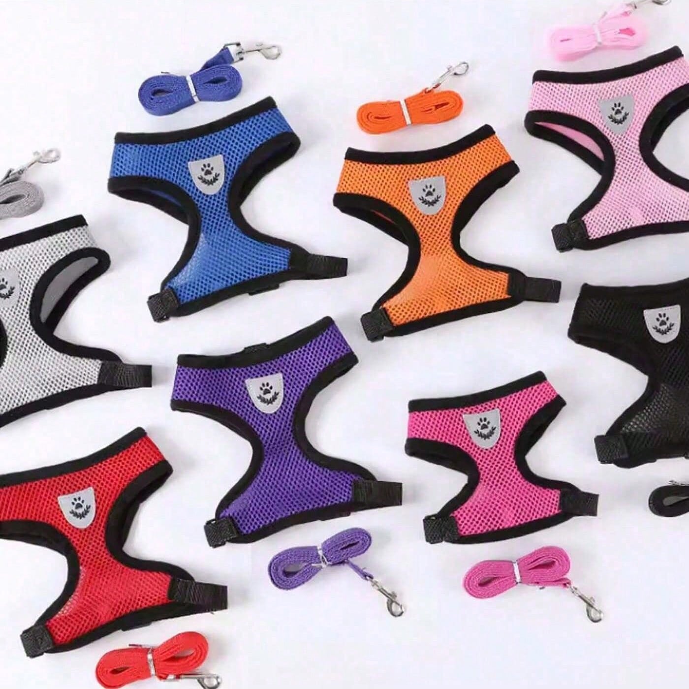 Multicolor polyester pet harness and leash set with breathable mesh, adjustable vest design, reflective details, and cartoon, colorblock, and plant patterns for small dogs and cats.