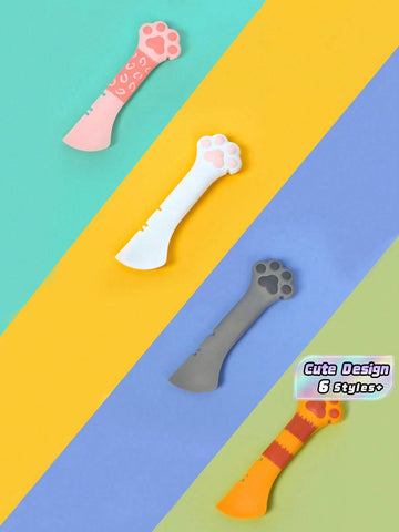 Multicolor cat paw shaped silicone pet can spoon and opener tool for feeding cats, dogs, and small animals.
