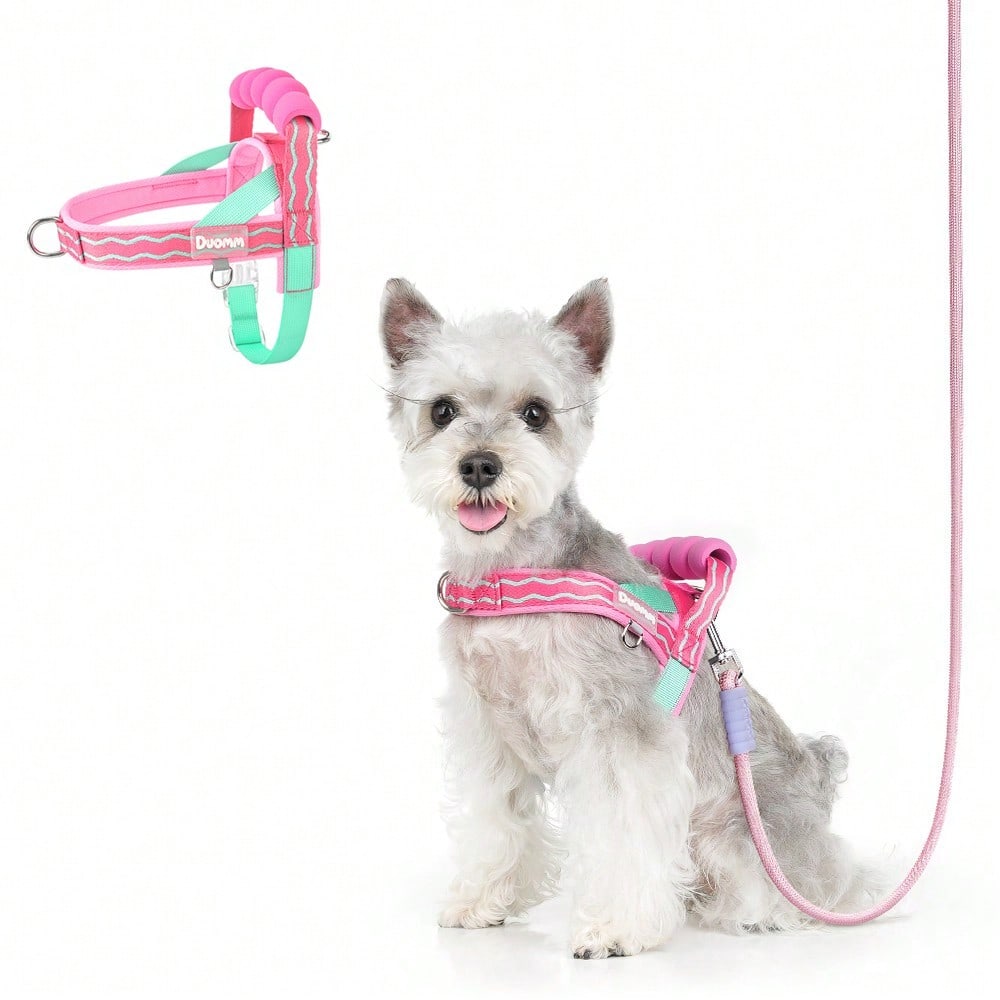 Pink polyester dog harness vest with top handle, D-ring leash attachment, adjustable straps, breathable mesh lining, and reflective wave pattern for small to medium dogs.