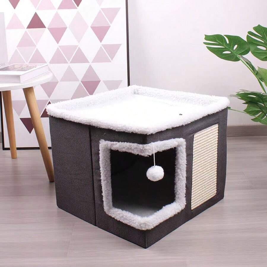 Grey foldable fabric cat cave bed featuring a scratch pad and hanging fluffy ball for indoor cats