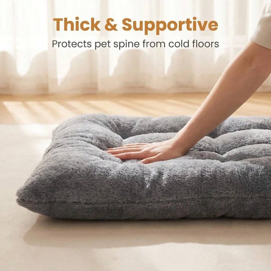 Grey XL dog sleeping pad made of polyester with a non-slip bottom and washable cover.