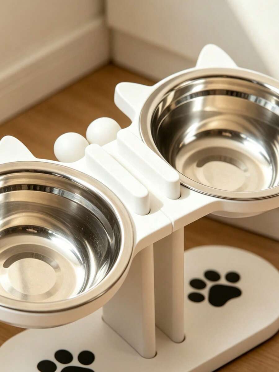 Elevated cat bowl stand with cute cat ears holding two stainless steel food and water bowls for cats and small dogs.