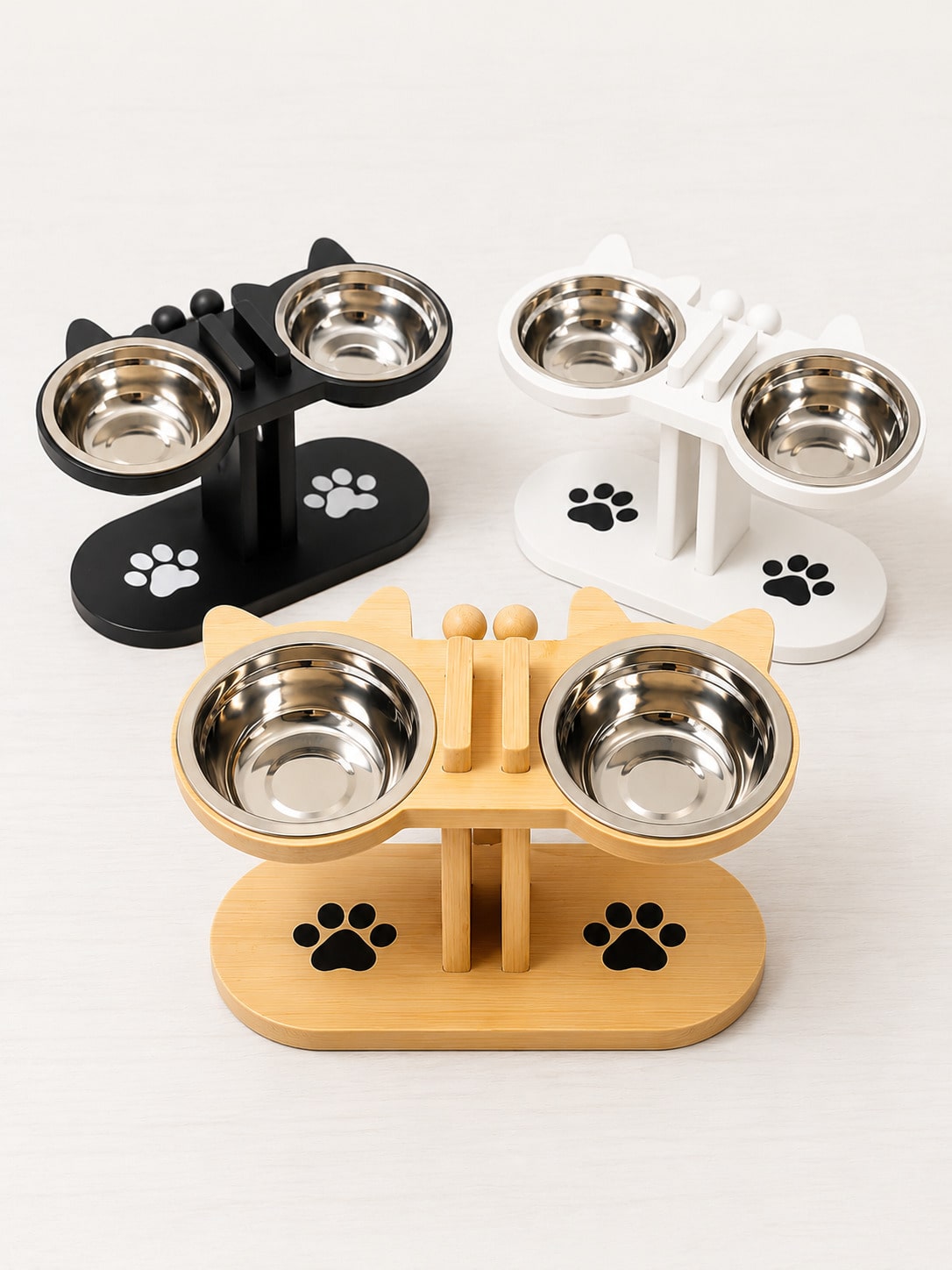 Elevated cat bowl stand with cute cat ears holding two stainless steel food and water bowls for cats and small dogs.