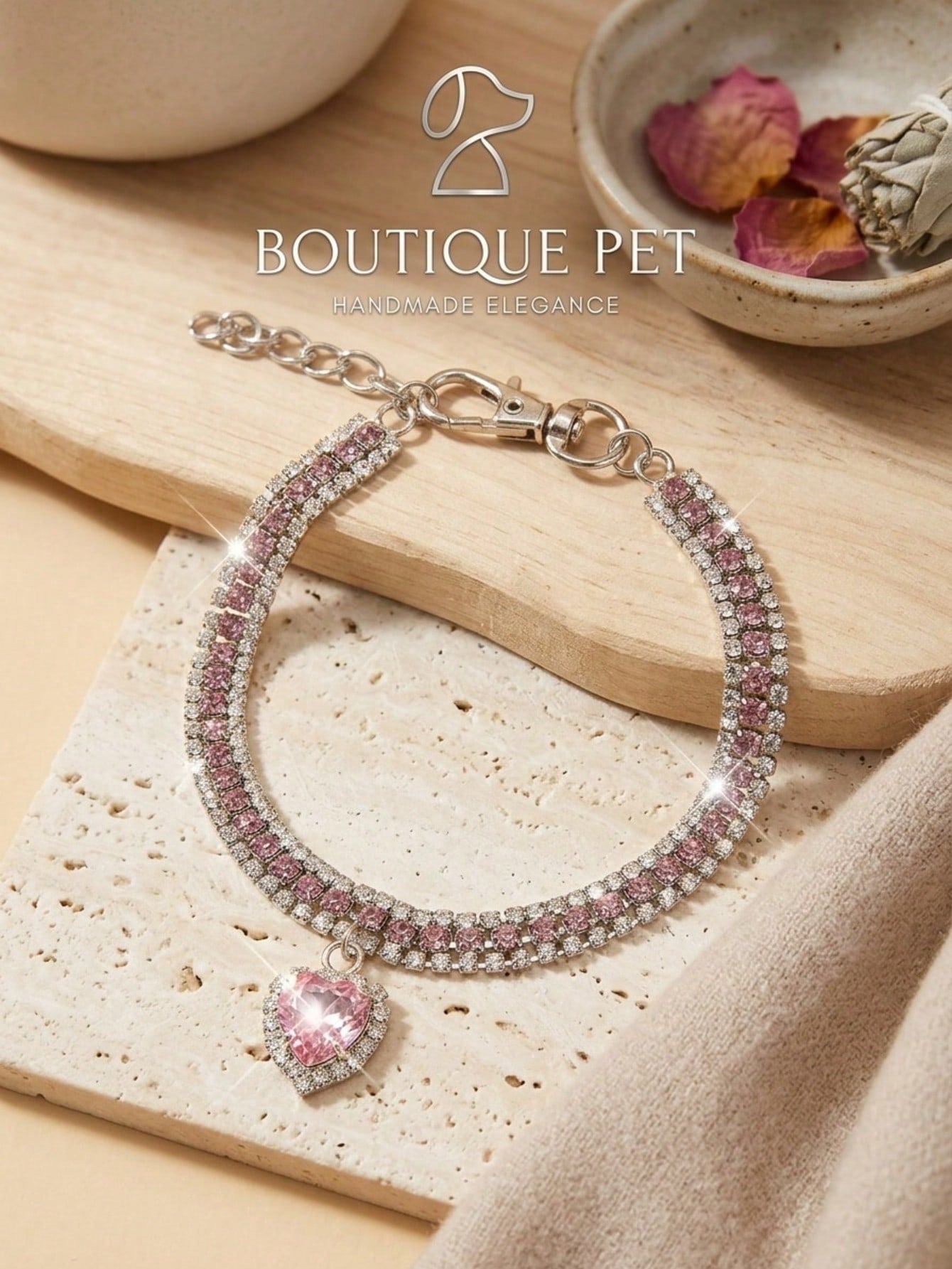 Pink adjustable cat and small dog collar with sparkly crystal heart detail and letter pattern, made from polyester with a breakaway design.