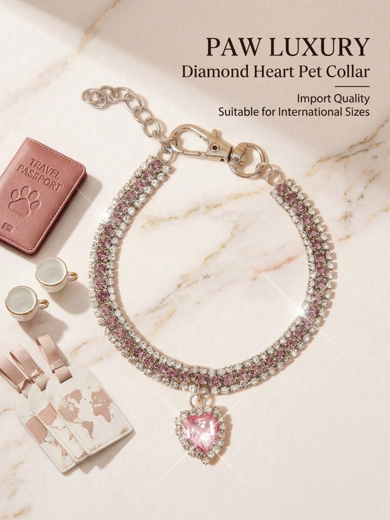 Pink adjustable cat and small dog collar with sparkly crystal heart detail and letter pattern, made from polyester with a breakaway design.